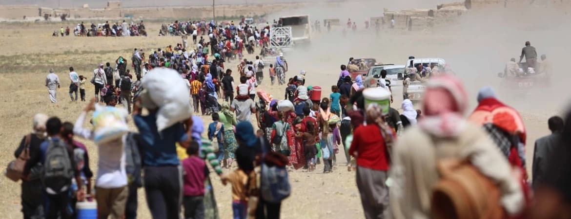 Foto: Ezidi Kürtlerin IŞİD'in saldırısı sonrası Şengal’den kaçışı, 9 Ağustos 2014. (Emrah Yorulmaz / Anadolu Ajansı)
