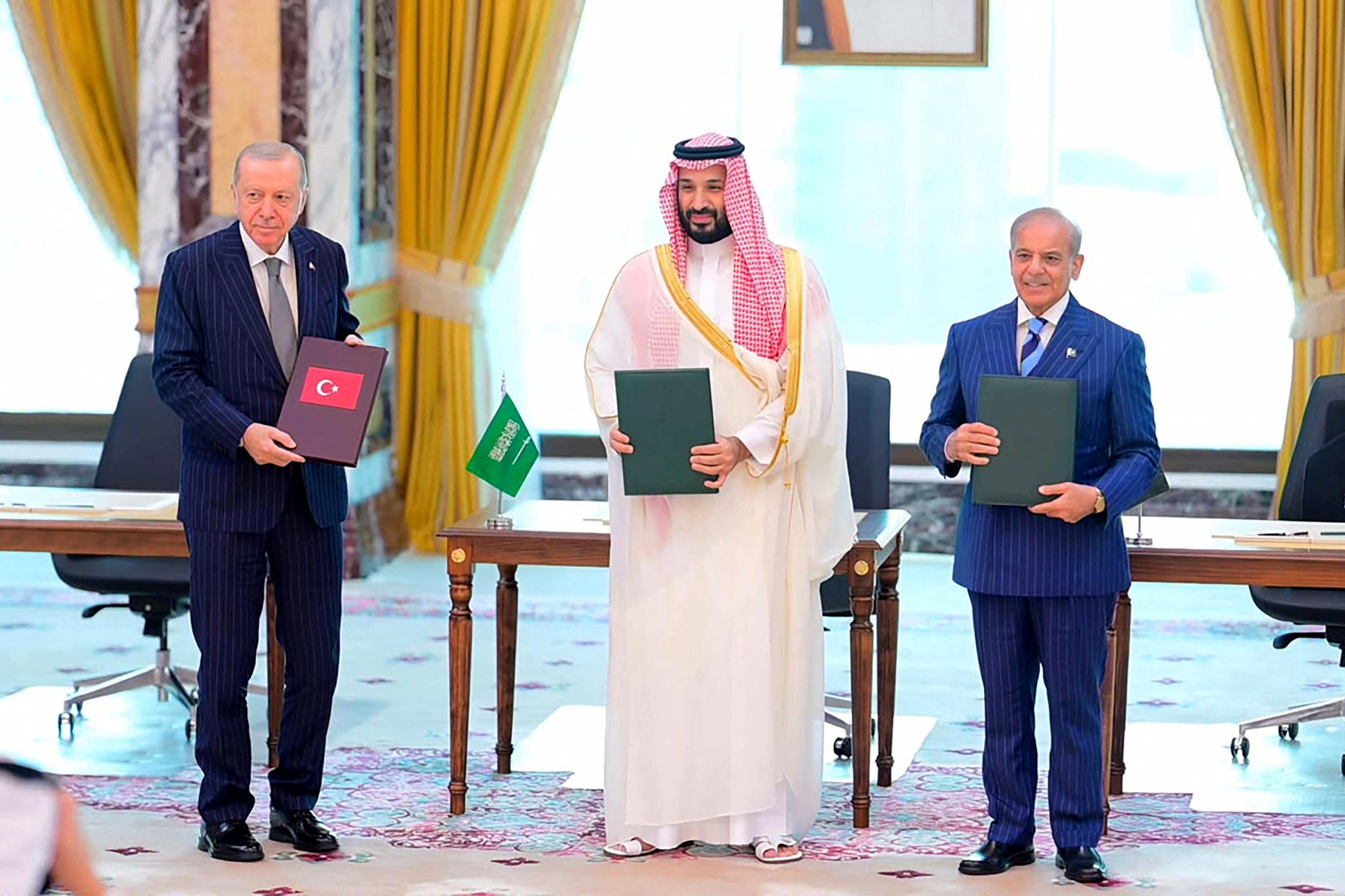 Leaders from Turkey, Pakistan and Saudi Arabia in Mecca, Saudi Arabia on August 7, 2026 after signing a defense pact. Photo: via AFP