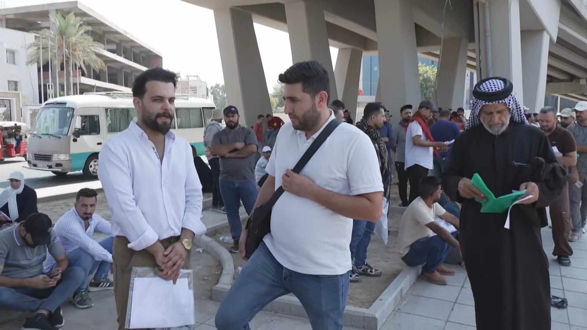 Demonstrators standing under a bridge in Baghdad on August 17, 2026. Photo: Screengrab/Rudaw