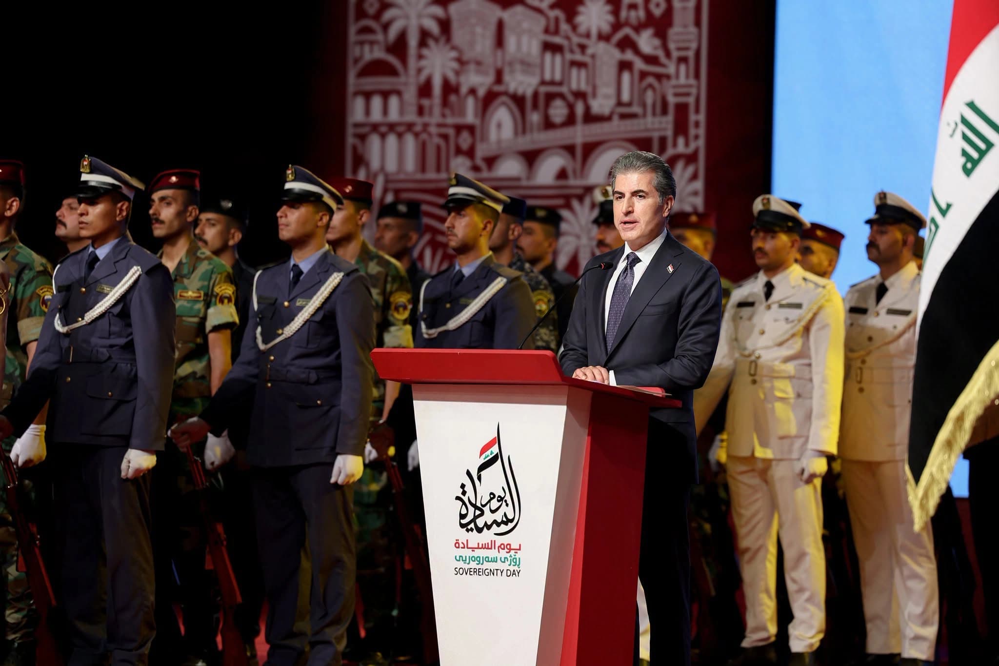 نێچیرڤان بارزانی، سەرۆکی هەرێمی کوردستان لە کاتی پێشکێشکردنی وتارەکەی لە رێوڕەسمی "رۆژی سەروەری عێراق" لە بەغدا.